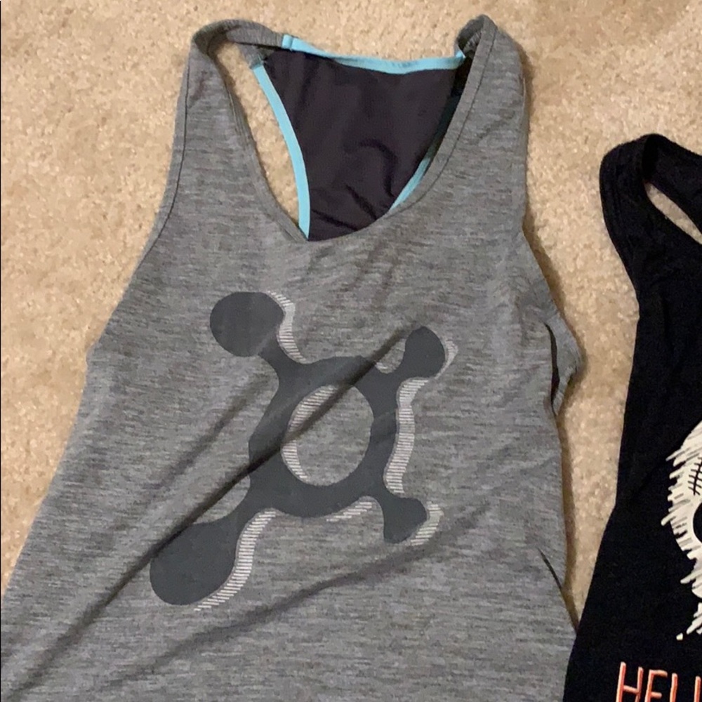 Two orangetheory tank tops